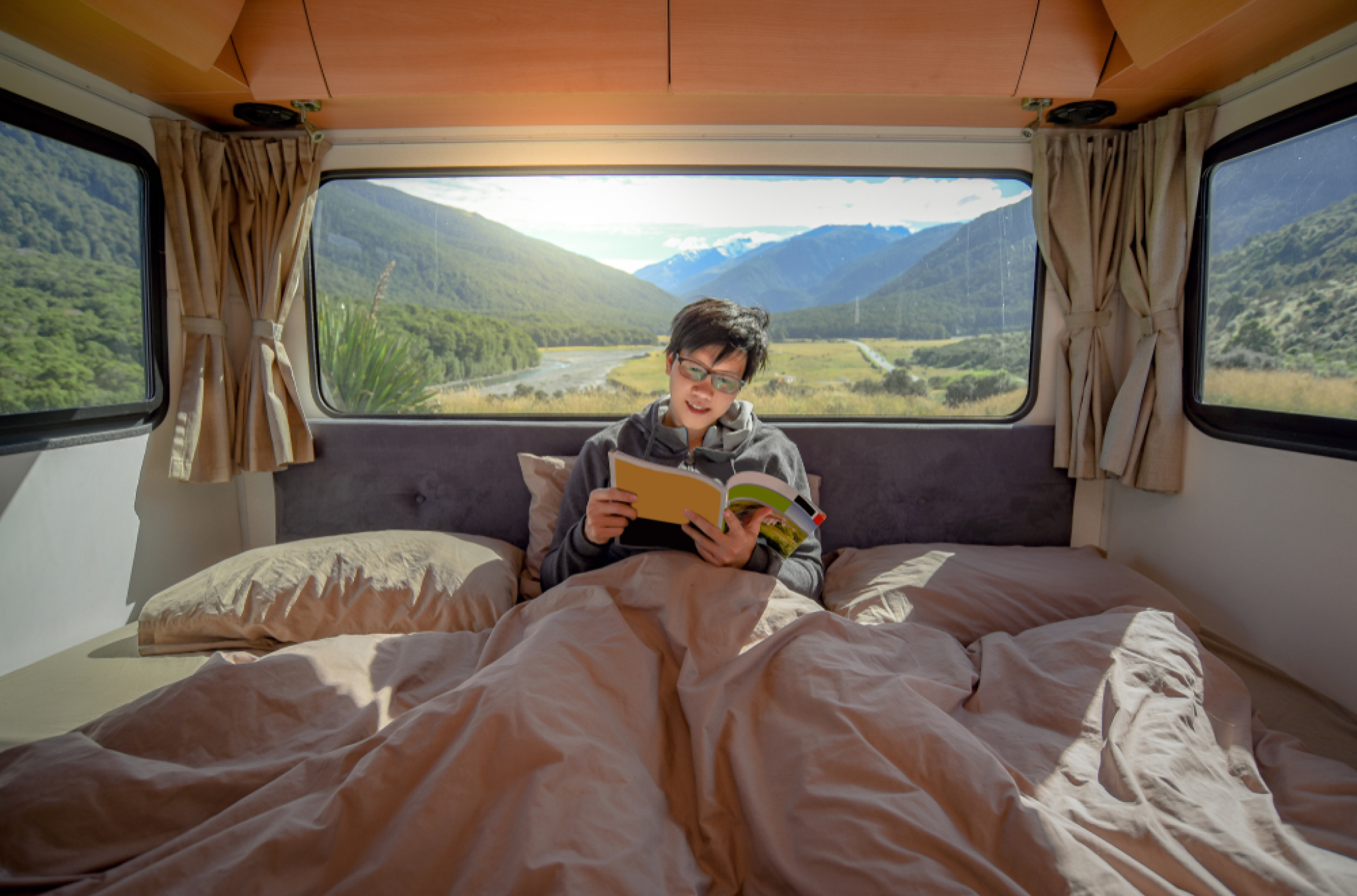 Employee managing or requesting leave in a digital system while they're traveling in an RV, related to employee leave management perks and benefits