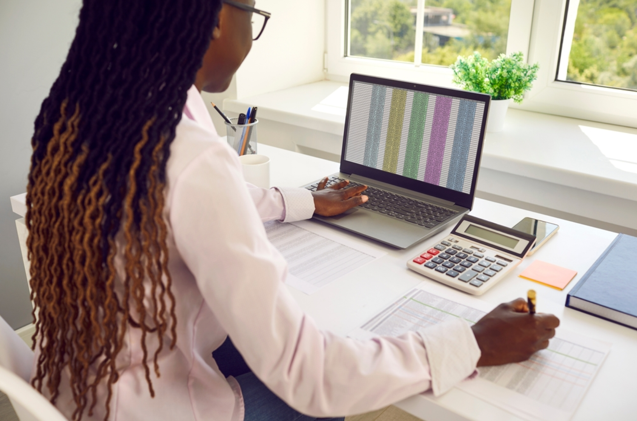 Payroll dashboard with error alerts and tax calculation tools, representing payroll management
