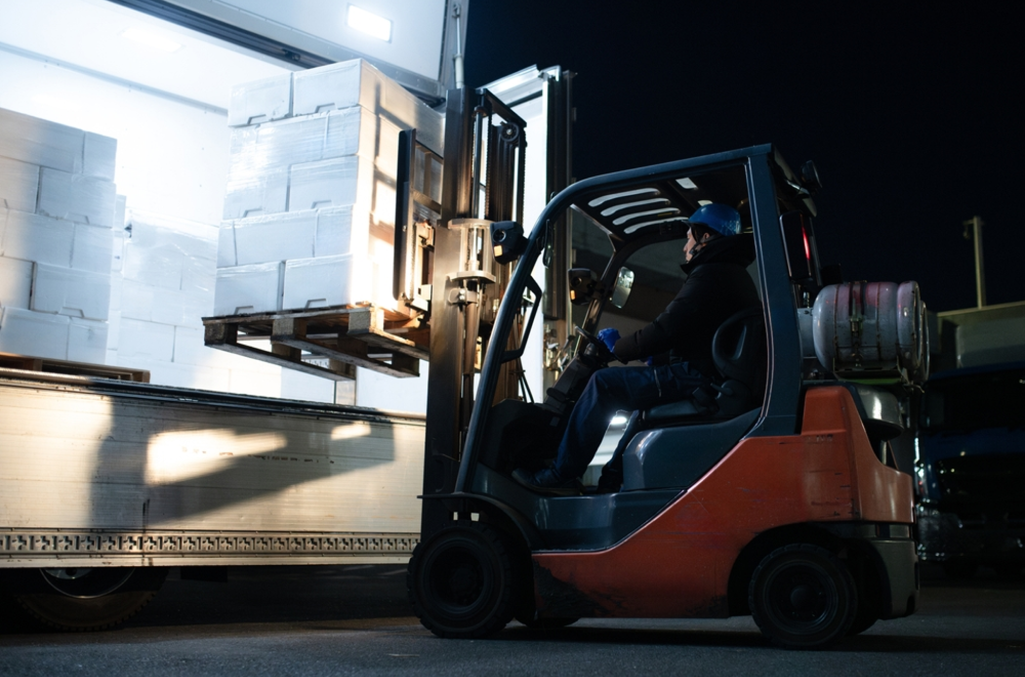 Visual representation of 2-2-3 schedule in a manufacturing facility with a forklift moving freight, signifying the schedule worked for labor fulfillment